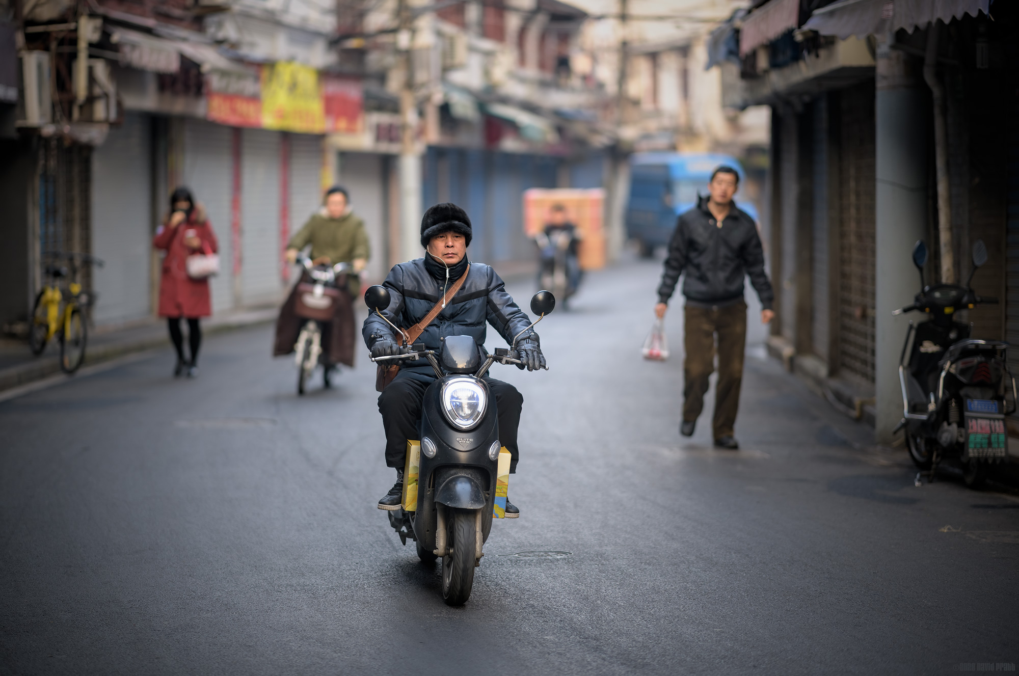 One Dangling Earphone