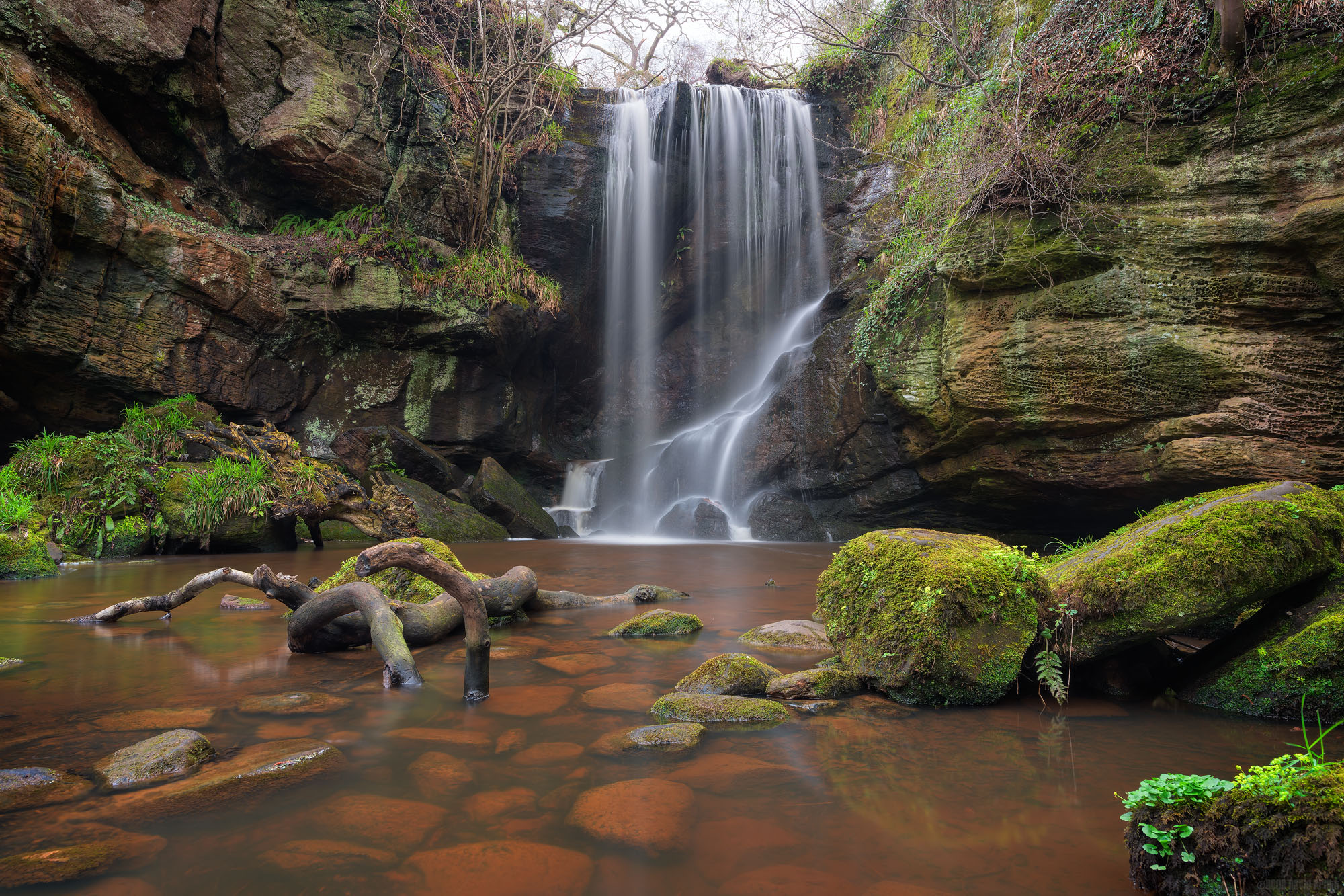 Pouring Over The Rocks